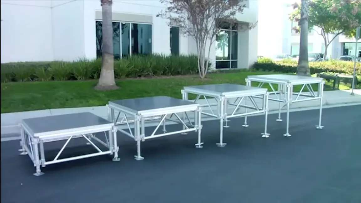a group of white tables outside